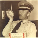 Captain Cheyne-Stout with his favorite zoo animal, Spiny, whom he kept as a pet in his office