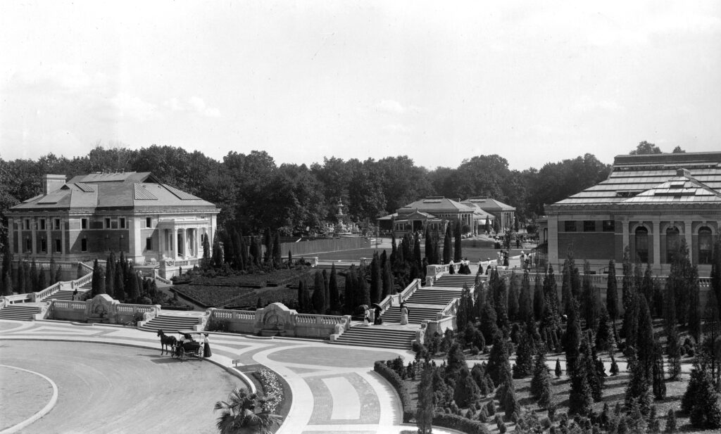 High angle view of Baird Court, circa 1909, with Administration building and Bird House flanking Italian Gardens and staircase at center.
